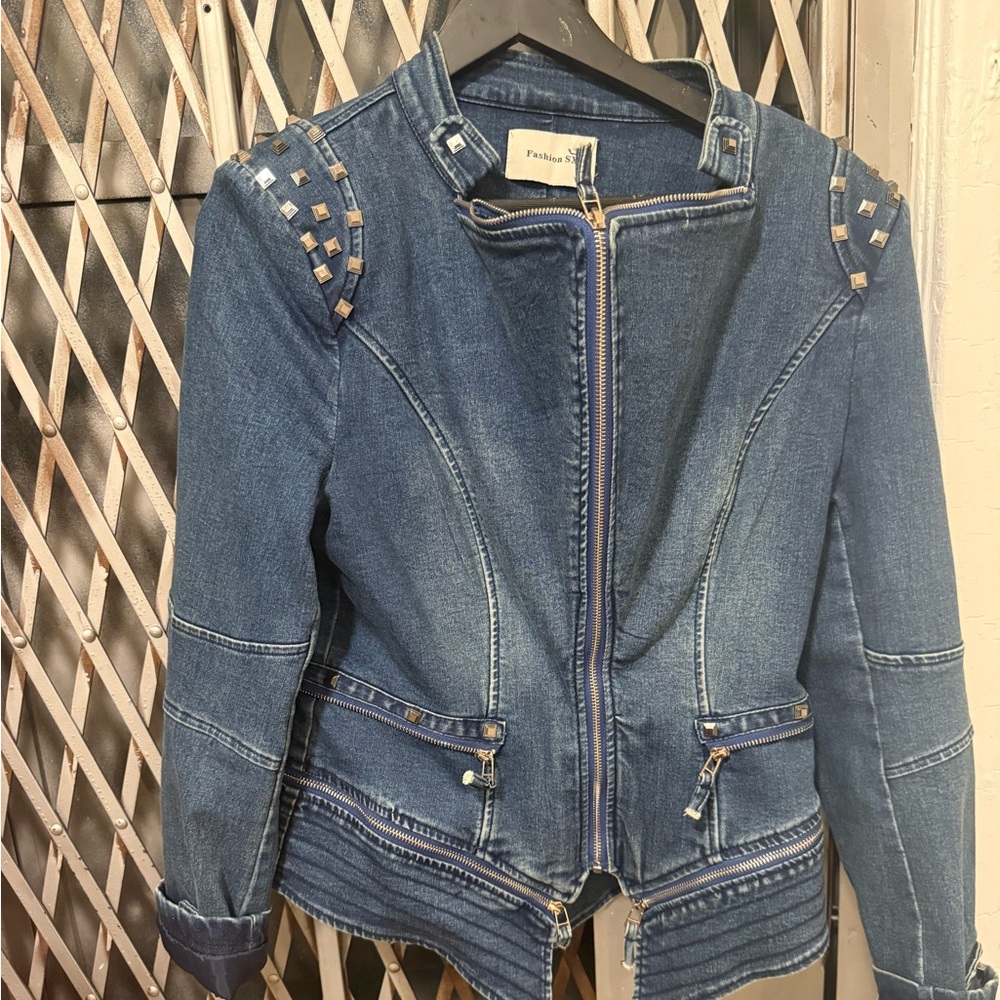 Blue jacket. bought from Goth N rock. New never worn no tag.